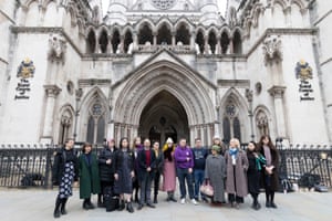 Trans youth group Gendered Intelligence stands outside the Royal Courts of Justice in London, UK, where a judge will hear a legal challenge against the NHS Commissioning Board over access to healthcare for people with gender dysphoria