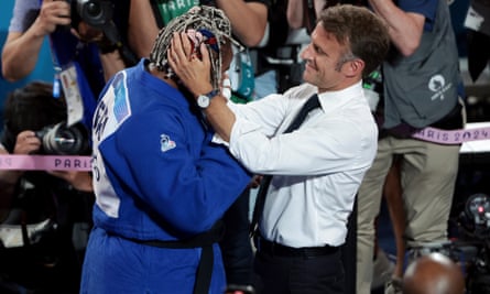 Romane Dicko is consoled by Emmanuel Macron