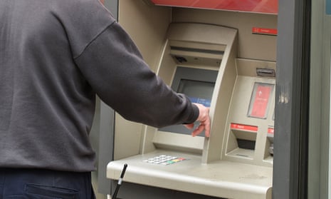 person using ATM