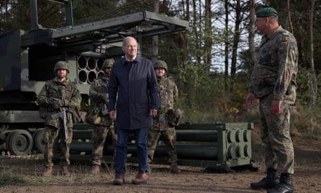 Olaf Scholz visits German troops during a training exercise