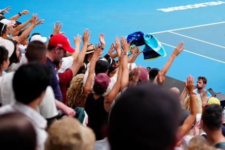 Stan Wawrinka celebrates with the crowd after progressing to round two.
