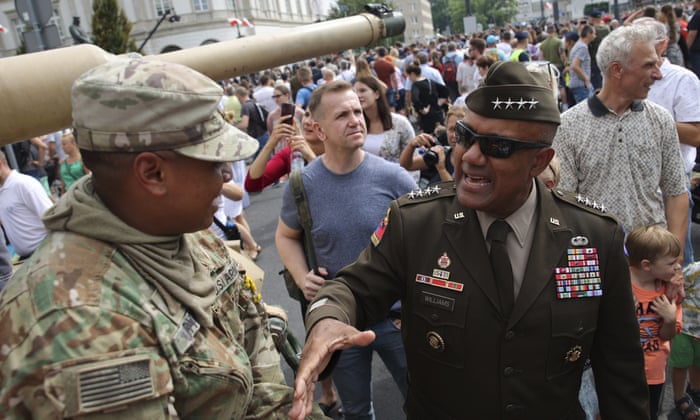 Gen. Darryl Williams, the new commanding general of United States Army Europe and Africa shakes hand with a US soldier during a picnic marking the Polish Army Day in Warsaw, Poland.