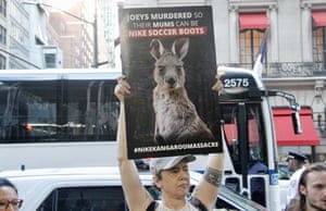 New York, US. People gather in front of a Nike store on 5th Avenue to protest against the killing of kangaroo mothers and joeys whose skins are used to make leather football boots