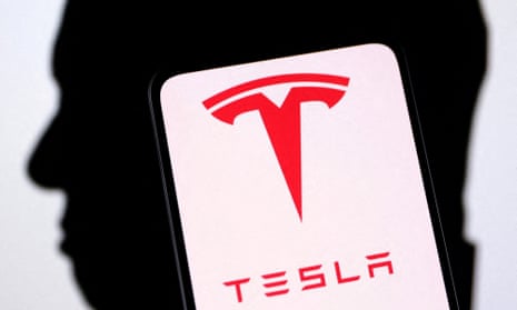 Tesla logo and Elon Musk silhouette