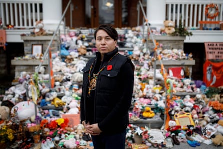 Chief Mark Hill, the chief of the Six Nations of the Grand River, poses at the grounds of the former Mohawk Institute Residential School, in Brantford, Canada.