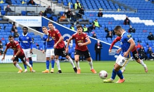 Neal Maupay of Brighton and Hove Albion scores their first goal from the penalty spot.