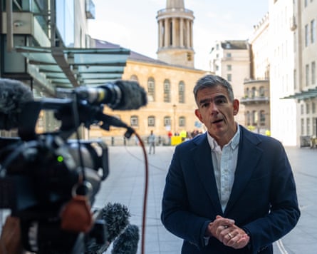 Matt Brittin talks to media cameras outside Broadcasting House.