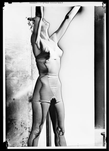 A solarised photograph for an underwear shoot for British Vogue by Lee Miller.