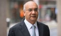 Keith Vaz wears a suit as he poses for a photograph in a street.