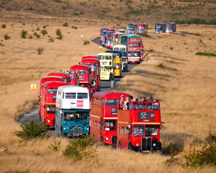 A convoy of buses makes its way across Salisbury Plain during the annual Imber Bus Day.