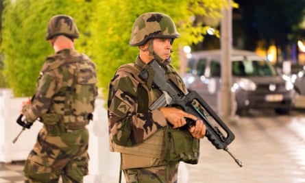 French soldiers stand guard in Nice