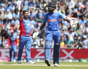 Afghanistan’s Aftab Alam, left, celebrates the dismissal of India’s Hardik Pandya, righ.
