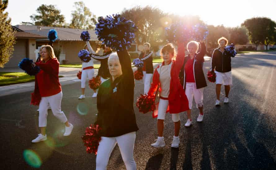 Members of the Sun City Poms cheerleading group practise marching and dancing in unison