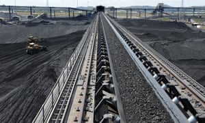 Coal is stockpiled before being loaded onto ships in Gladstone, Queensland