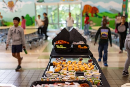 children walking by a table