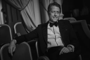 Award presenter Hugh Grant shared a box with his wife, Anna Eberstein