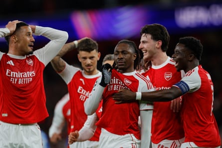 Eberechi Eze celebrates scoring his first Champions League goal with teammates including Declan Rice and Bukayo Saka