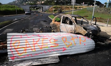 A slogan referring to French loyalist Sonia Backes on an abandoned barricade in Noumea, New Caledonia.