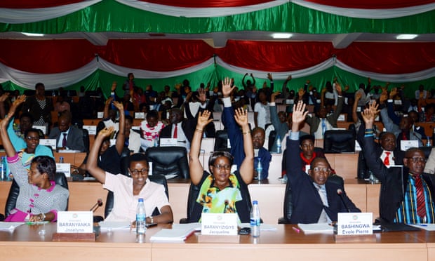 Members of Burundi’s parliament raise their arms to vote in Bujumbura on Wednesday.