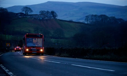 A rural bus service at dusk in Derbyshire.