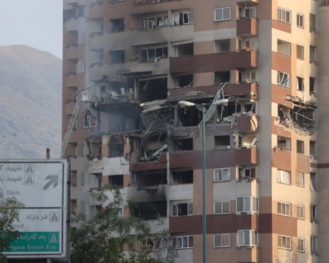 Smoke rising from damaged building in Tehran after Israeli strike