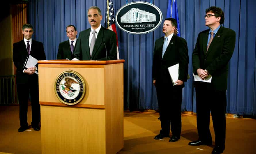 US government and FBI officials during a news conference at the Department of Justice in Washington, 2009.