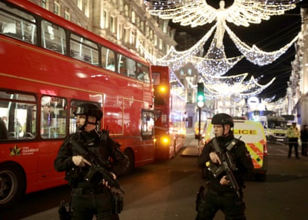 False alarm … police officers near Selfridges on Oxford Street, London.