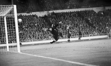 Mexico keeper Ignacio Calderon tries in vain to stop Bobby Charlton giving England the lead during the 1966 World Cup