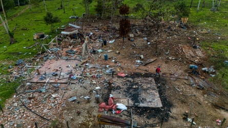 Aerial view of a bomb site, with debris strewn across a wide area