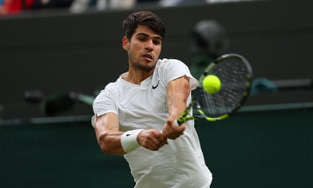 Carlos Alcaraz hits a backhand