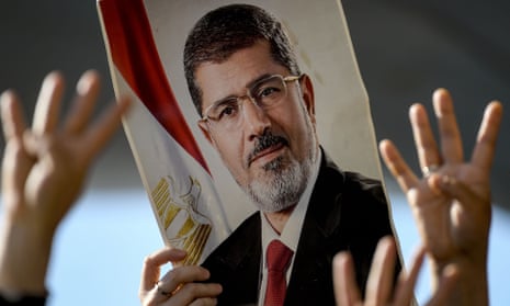 People attend symbolic funeral ceremony for Mohamed Morsi in Istanbul.