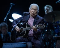 Paul Simon performing in Liverpool.