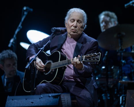 Paul Simon performing in Liverpool.