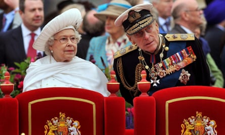 The Queen and the Duke of Edinburgh watching proceedings from the royal barge during the diamond jubilee pageant on the River Thames, 2012.