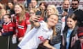 Spurs’ Matilda Vinberg takes a photo with fans after their 2-2 WSL draw with Manchester United in April.