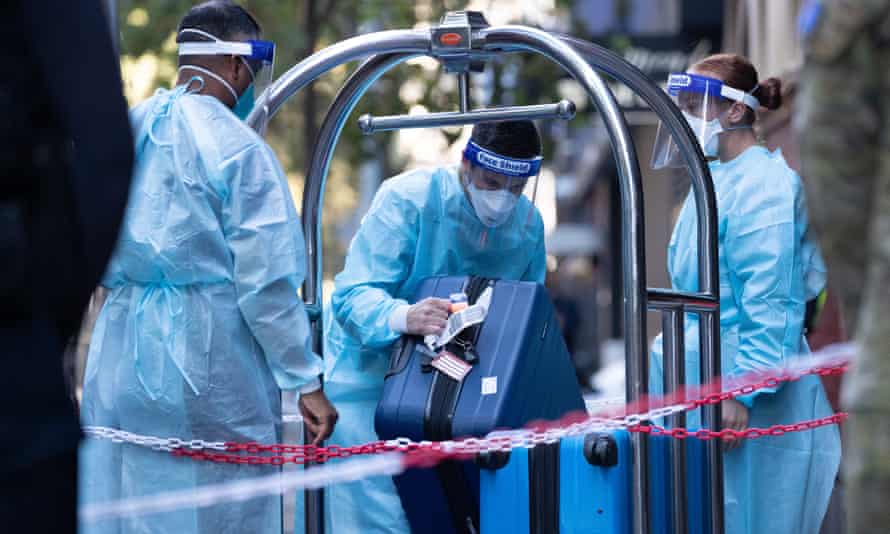 Hotel quarantine workers in full PPE at the Intercontinental Hotel in Melbourne on 8 April.