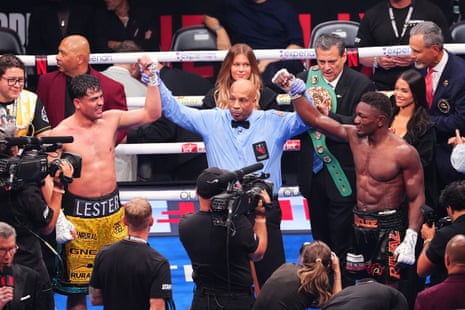 Lester Martinez, left, and Christian Mbilli react after their split draw on Saturday night.