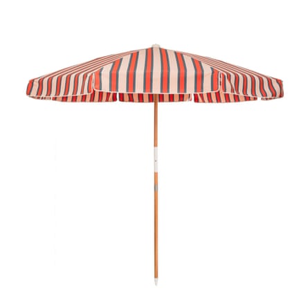 An Amalfi Umbrella in Bistro Dusty Pink and cream Stripes from Business & Pleasure