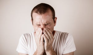 A man sneezing
