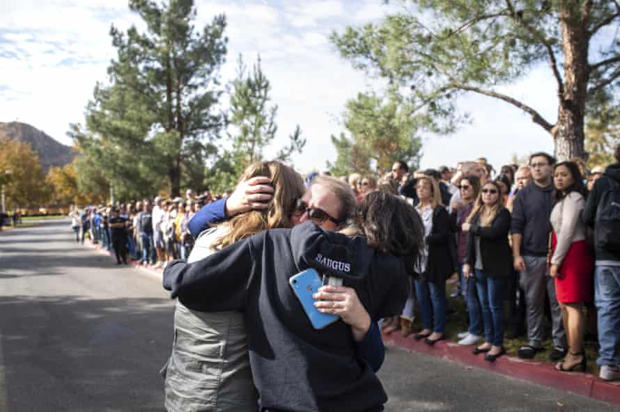 Students reunite with their families after the shooting at Saugus high school.