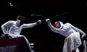 Dimitri Coutya of Britain in action against Andrei Pranevich of Belarus in their men’s individual epee - Category B bronze medal bout.
