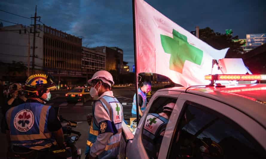 Medics on standby at Din Daeng intersection.