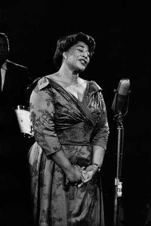 Ella FitzgeraldA portrait of American jazz singer Ella Fitzgerald often referred to as the First Lady of Song, Queen of Jazz and Lady Ella, performing on stage at Newport Jazz Festival, 1957. This performance was being recorded for Ken Nordine’s television show