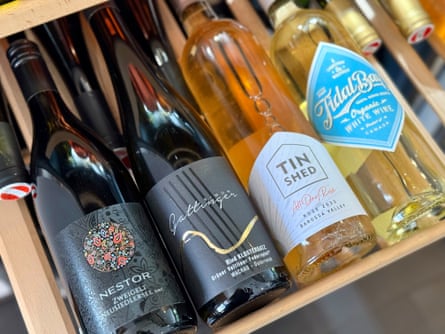 A box of Good Wine Good People wine bottles.