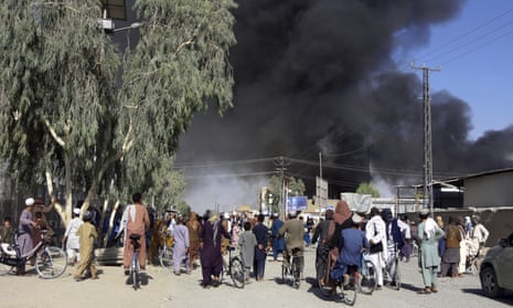 Smoke rises above Kandahar after fighting between the Taliban and Afghan security forces