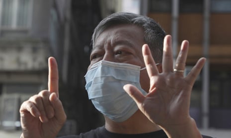 Hong Kong pro-democracy activist Lee Cheuk-Yan gives the ‘five demands, not one less’ hand sign. Zoom has admitted it disrupted activists’ meetings at the behest of the Chinese government.