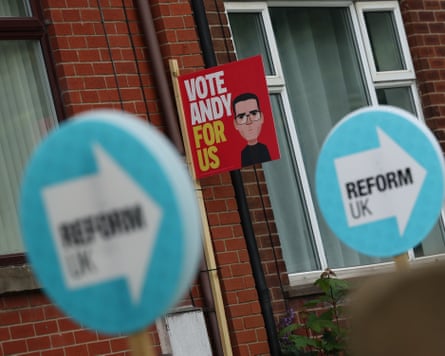 Competing placards for Labour and Reform UK in Makerfield