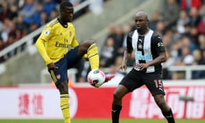 Nicolas Pépé, who came on as a substitute for Arsenal with 20 minutes left, looks focused and composed as Newcastle Unitedâs Jetro Willems closes in.
