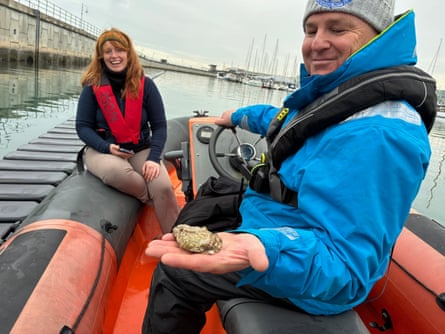 Boyle and Collins in a boat