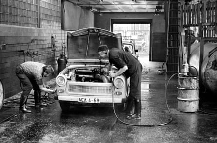 Men working on a Trabant in Rostock in 1989.